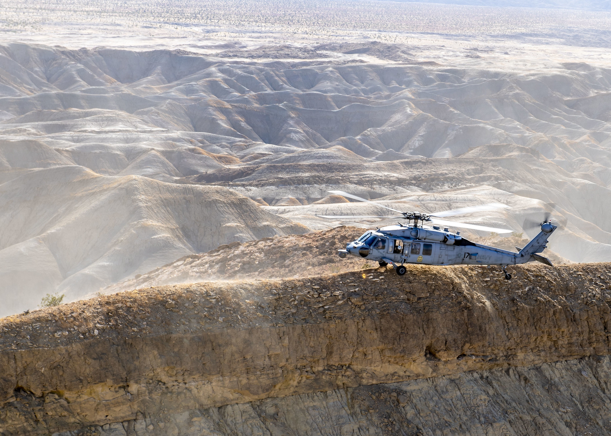An MH-60S Sea Hawk helicopter stationed in San Diego practices terrain flight tactical landings on Oct. 1, 2020, during Helicopter Advanced Readiness Program (HARP) training at Naval Air Facility El Centro, Calif.