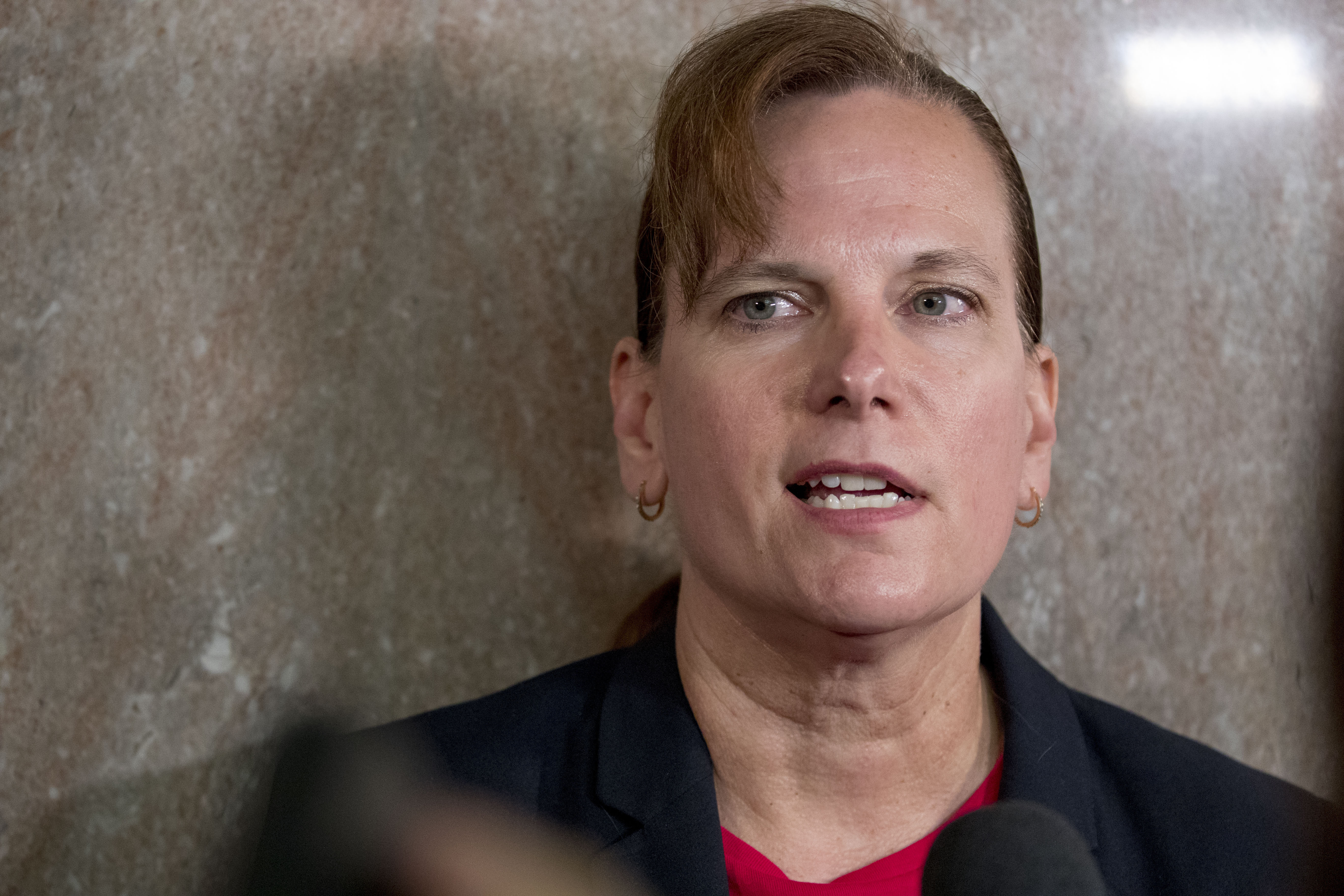 Army Col. Kathryn Spletstoser speaks to members of the media following Gen. John Hyten's confirmation hearing to be vice chairman of the Joint Chiefs of Staff before the Senate Armed Services Committee on Capitol Hill in Washington, July 30, 2019.